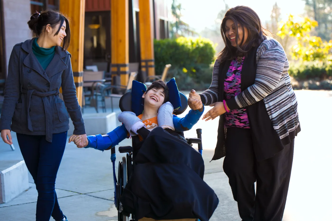 A support worker out in the community with a participant